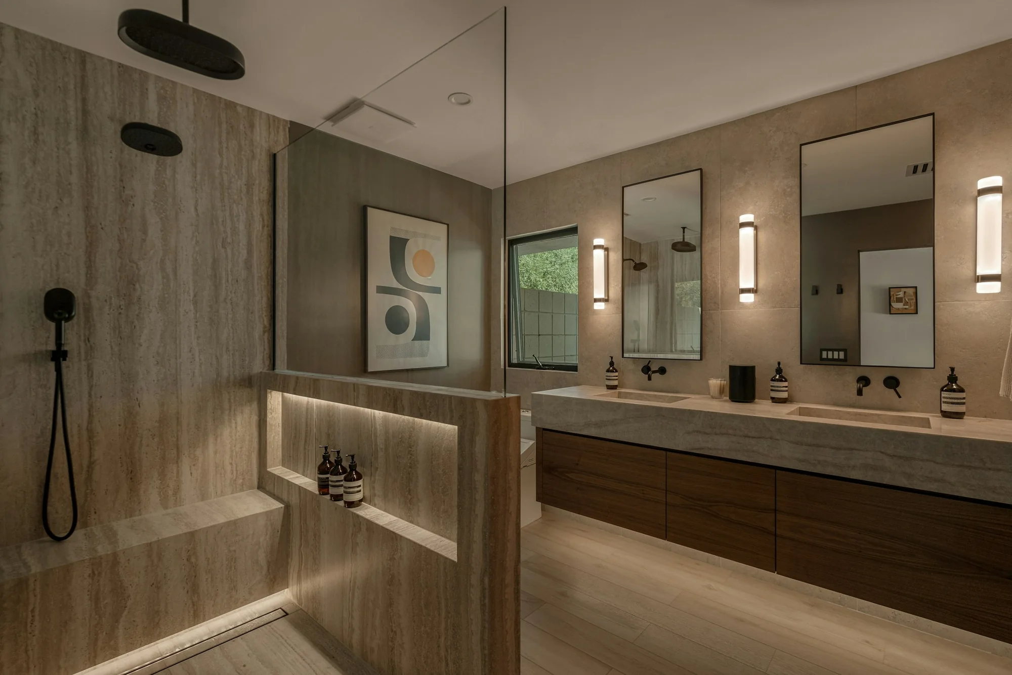 Modern bathroom with warm wood vanity and walk-in shower