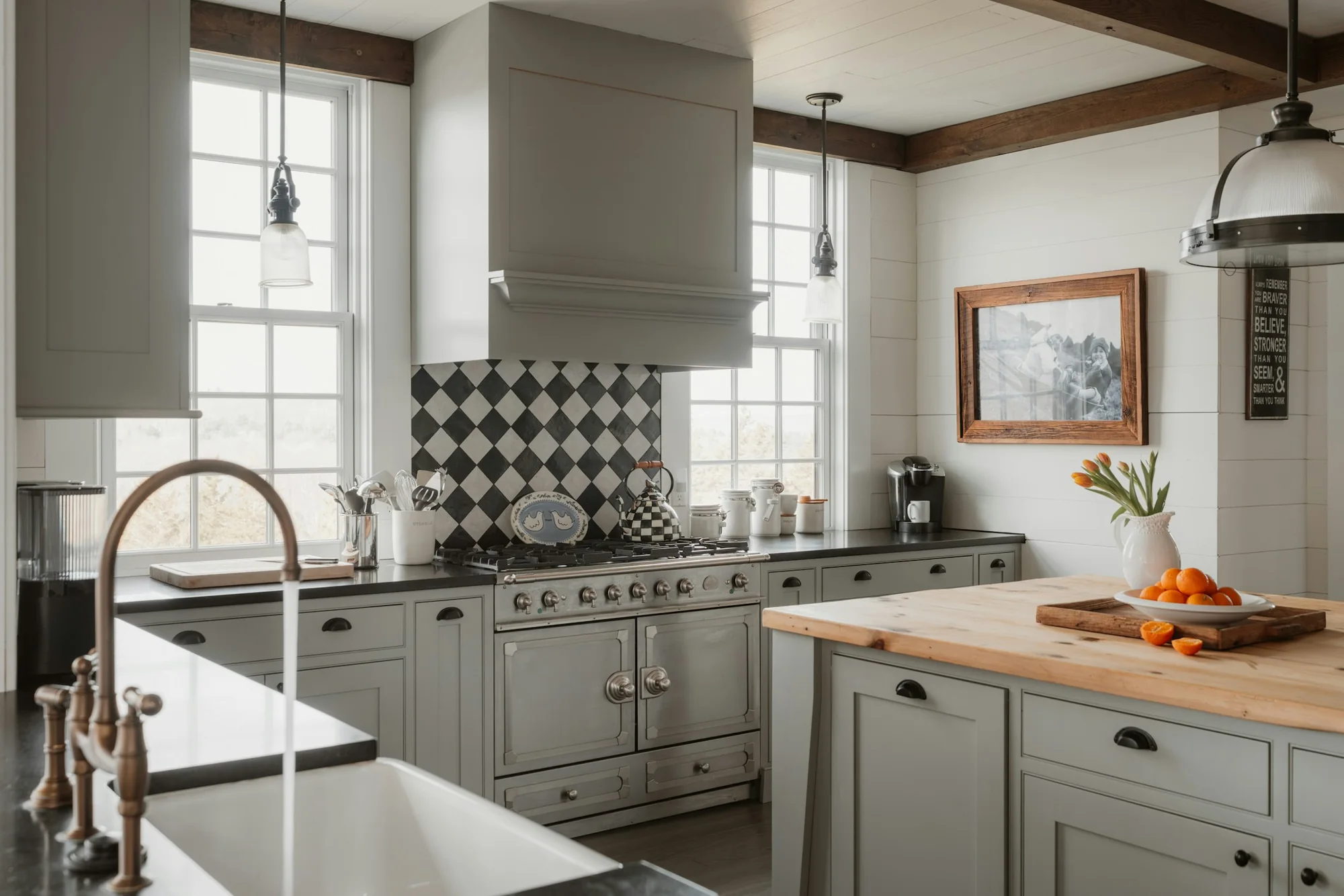Gray farmhouse kitchen with a natural wood island