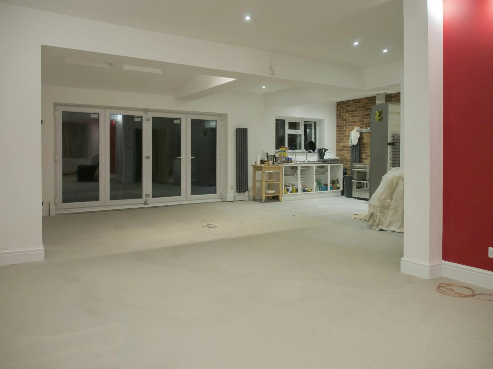 Light-filled renovated living area with wide doors